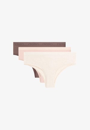 Drei nahtlose Baumwollunterwäsche in Creme, Hellrosa und Braun mit breiten Bundbändern und dezentem "OYSHO"-Logo.