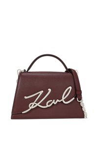 Burgundy leather handbag with angular design, featuring a silver metal "Karl" logo and detachable shoulder strap. Textured finish.