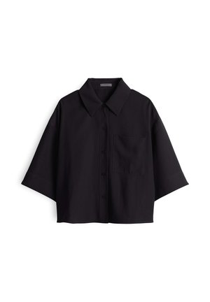 Black cropped shirt made of smooth fabric, featuring a structured collar, button front, short sleeves, and a single chest pocket.