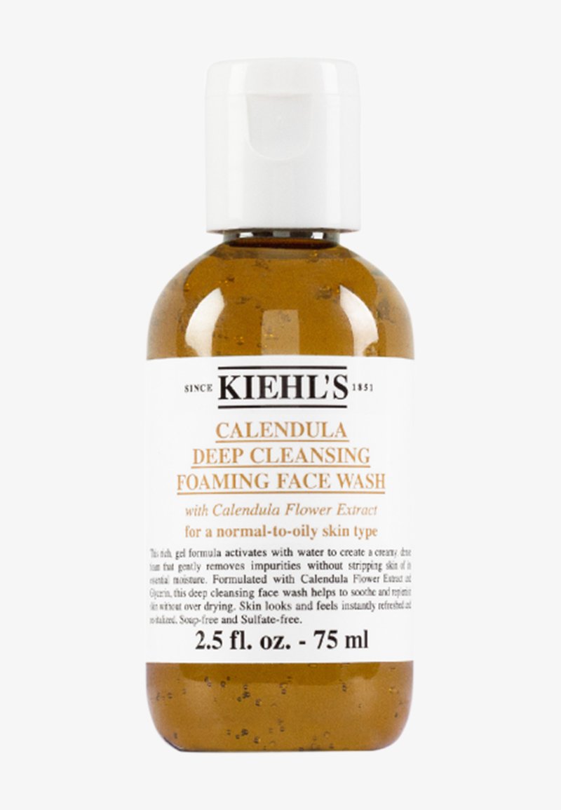 Klare Kunststoffflasche mit einem weißen Klappdeckel, die bernsteinfarbendes Gel enthält. Das Etikett weist schwarzen und orangen Text auf; Größe 2,5 fl. oz. (75 ml).