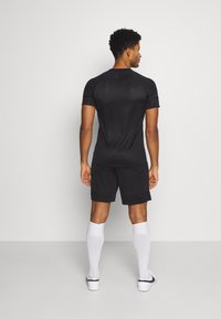 Nike Performance Calções desportivos - black/white
