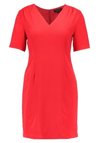Röd klänning med korta ärmar, V-ringning och rak silhuett. Tillverkad av ett slätt tyg med en subtil lyster. Dragkedja bak.