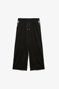 Fiorella Rubino JOGGERS CON BORDO STAMPATO - Trainingsbroek - nero Fiorella Rubino JOGGERS CON BORDO STAMPATO - Trainingsbroek - nero