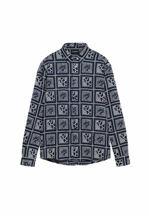 Long-sleeve shirt in dark navy with a patterned design featuring white squares, leaves, and decorative borders. Collared with button closure.