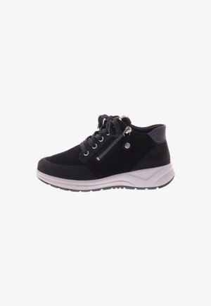 Black suede sneaker with white rubber sole, featuring laces, side zipper detail, and a smooth leather heel accent.