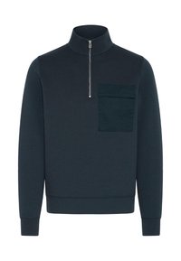 Men's pullover sweatshirt in dark navy, featuring a high collar, zip closure, and a left chest patch pocket with tonal stitching. Soft texture.