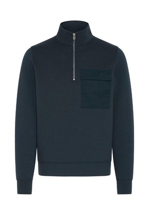 Men's pullover sweatshirt in dark navy, featuring a high collar, zip closure, and a left chest patch pocket with tonal stitching. Soft texture.