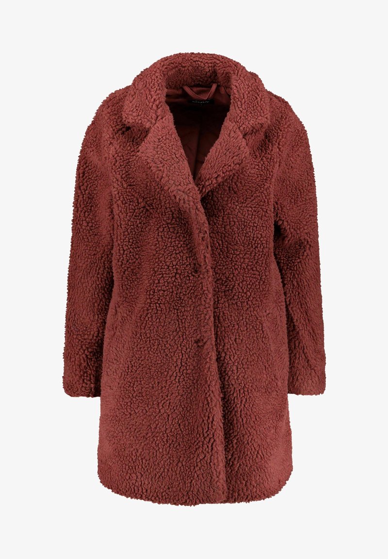 Płaszcz wykonany z pluszowego, fakturowanego materiału w głębokim rdzawym kolorze. Posiada wycięty kołnierz, frontowe guziki oraz długość do połowy uda.