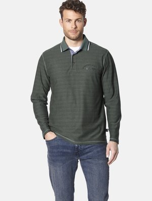 Dark green long-sleeve polo shirt with a textured pattern, ribbed collar, and white accents, paired with blue jeans.