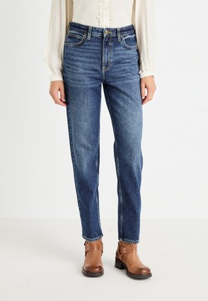 High-waisted blue denim jeans with a straight leg fit, featuring subtle fading, five-pocket design, and gold-tone hardware accents.