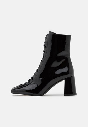 Schnürstiefelette - black