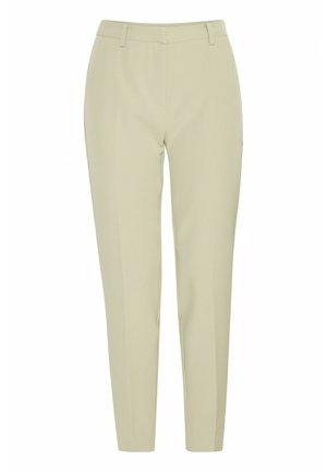 Vaaleanvihreät mittatilauspöksyt, joissa on slim fit -leikkaus. Varustettu vyölenkeillä, kahdella sivutaskulla ja sileällä pinnalla. Ei näkyviä kuvioita tai yksityiskohtia.