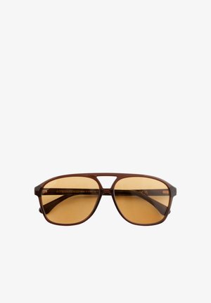 Brown plastic aviator sunglasses with amber tinted lenses and a double bridge on a white background.