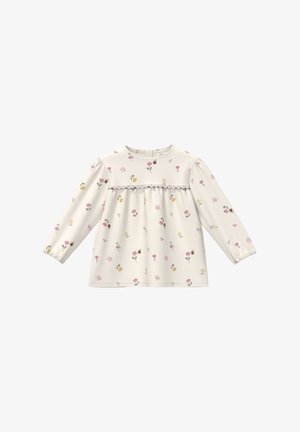 Haut crème à manches longues pour tout-petit avec imprimé de fleurs roses et jaunes ainsi qu'abeilles, bordure en dentelle sur la poitrine, poignets élastiques.