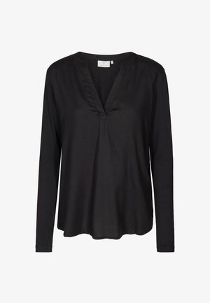 Chemise noire à manches longues avec col en V et coupe ample, en tissu léger.