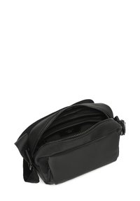 Borsa a tracolla nera in nylon con chiusura a zip, tracolla regolabile e scomparti multipli. Texture liscia e design minimalista.