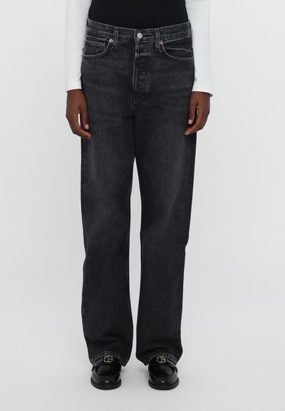 Dark wash straight-leg jeans made of denim, featuring a high waist, classic five-pocket design, and subtle stitching details.