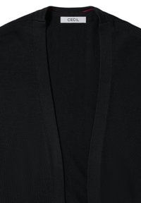 Zwarte cardigan met een open voorkant, gemaakt van een textuur gebreid materiaal. Heeft een klein label met het opschrift "CECIL" bij de halslijn.