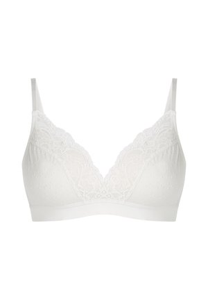 Weißer Soft-Cup-BH mit Spitzenbesatz und gepunkteter Textur, verstellbaren Trägern und elastischem Unterbrustband für Halt.