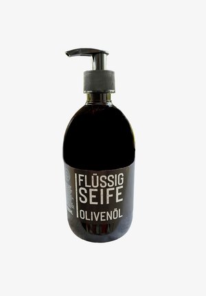 Schwarze Pumpspenderflasche mit Flüssigseife und metallicfarbigem Pumpmechanismus, versehen mit einem weißen Etikett, auf dem steht "Flüssig Seife Olivenöl." Füllmenge: 300ml.
