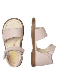 Lichtroze leren sandalen met twee verstelbare banden, een gevoerde binnenzool en een gestructureerde rubberen zool voor grip.