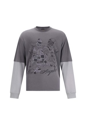 T-shirt gris à manches longues avec un graphisme de crâne et le texte "Death or Glory Los Angeles". Dispose de manches contrastantes en gris clair et d'un col rond.