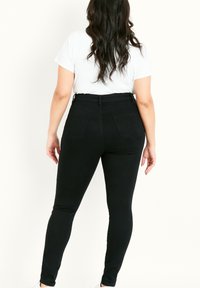Evans Skinny-Farkut - black