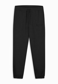 Zwarte joggingsbroek gemaakt van een zachte, textuurrijke stof; voorzien van een elastische tailleband met een trekkoord en elastische boorden bij de enkels.