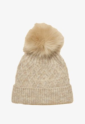 Knit beanie in light beige with a textured diamond pattern and a fluffy faux fur pom-pom on top; ribbed cuff at the base.