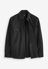 Schwarze Jacke aus einem strapazierfähigen Stoff, mit einem Reißverschluss vorne, zwei Brusttaschen mit Klappen und einem klassischen Kragen.