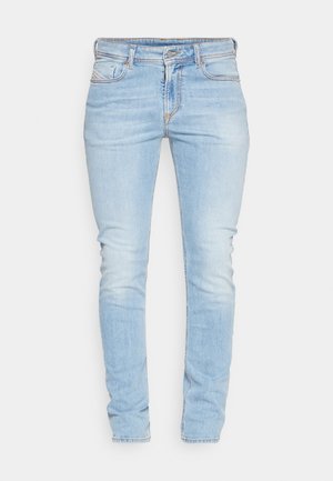 Helle blaue Skinny-Jeans aus Denim mit einem Frontreißverschluss, fünf Taschen und Kontrastnähten. Glatte Textur mit leichter Ausbleichung.