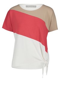 Bomull t-shirt med rund halsringning som har en färgblockdesign i beige, korall och vitt; inkluderar en sidoknutdetalj för extra stil.