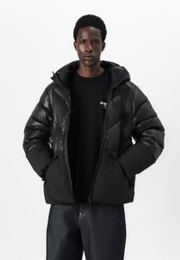 Helly Hansen VILLAGE UNISEX - Daunenjacke - black