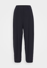 Laivaston siniset räätälöidyt housut, leveä lahje, jossa on sileä rakenne, laskostettu etuosa ja hienovarainen brändäyskorostus.