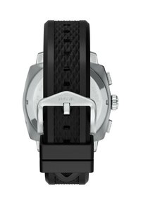 Montre Fossil avec un bracelet en caoutchouc texturé noir et une boucle en métal argenté, et un boîtier en forme d'octogone.