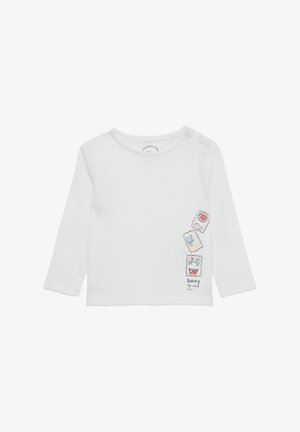 Witte lange mouwen shirt van zacht katoen, met speelse geborduurde ontwerpen van kleurrijke wezens aan de zijkant. Inclusief drukknopen voor sluiting.
