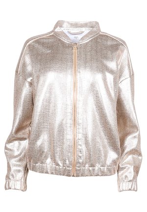 Metallic bomberjacka i glänsande guld med ribbade muddar och nederkant. Har dragkedja framtill och en strukturerad krage, textur med ett subtilt mönster.