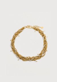 Náhrdelník z pozláteného twisted re�ťazca s priehľadnými kryštálmi a malými bielymi perlami, vybavený karabínkovým uzáverom a nastaviteľnými článkami.