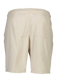 Beige shortsit, joissa on joustava vyötärö, teksturoitu kangas, yksi takatasku ja rento istuvuus, loppuen juuri polven ylle.
