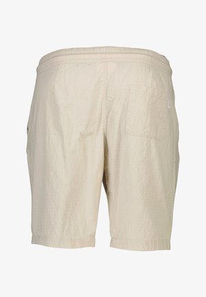 Beżowe szorty z elastycznym pasem, wykonane z teksturowanej tkaniny, z jedną tylną kieszenią oraz luźnym krojem kończącym się tuż nad kolanem.