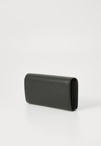 Black leather wallet with a textured surface, rectangular shape, and a smooth edge. Opened slightly to show the interior.