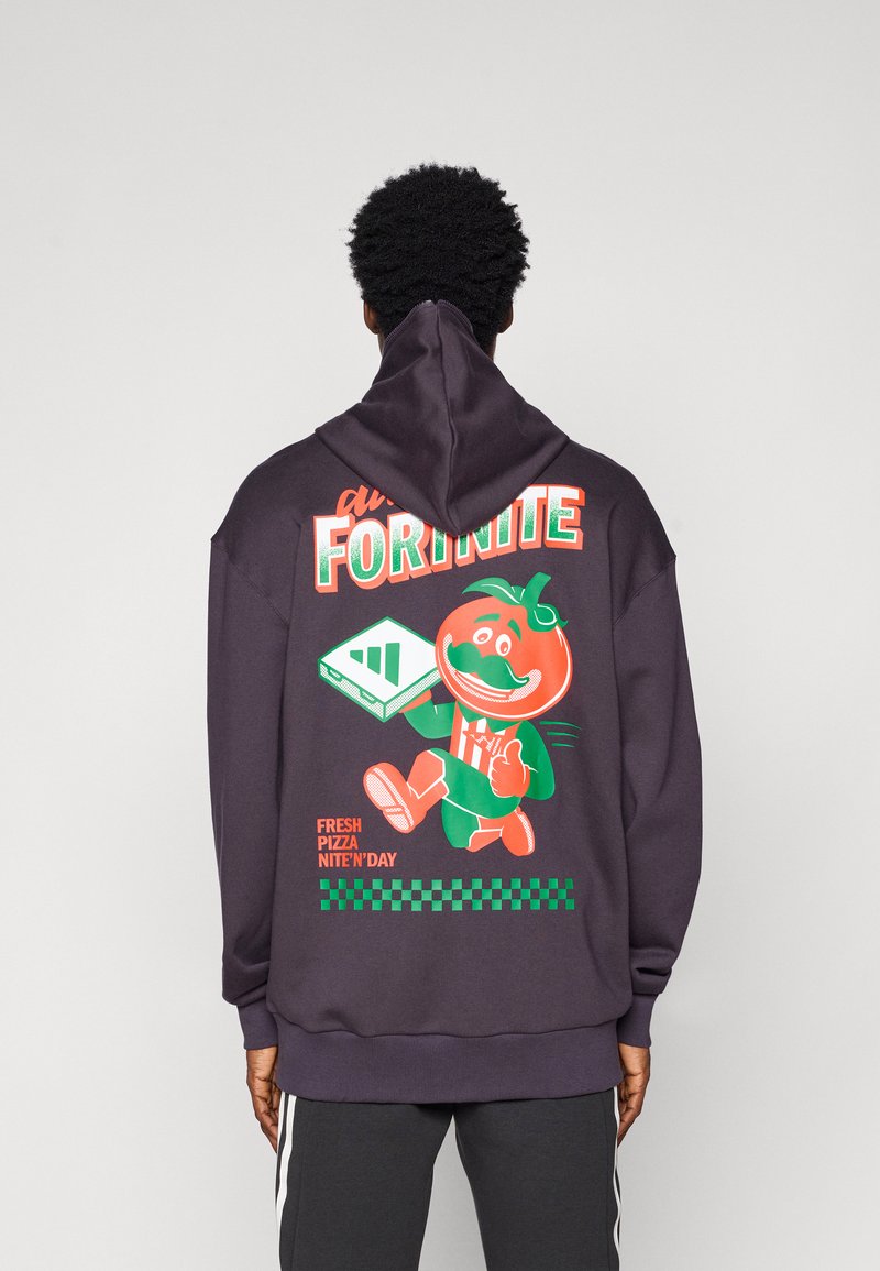 Sweatshirt roxo escuro com uma gráfica colorida de um personagem tomate a segurar um console de jogos, com o texto "FRESH PIZZA NITE'N'DAY."