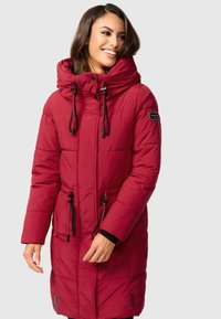 Red padded jacket with a hood, adjustable drawstrings, and elastic cuffs. Features a sleek design and visible stitching patterns.