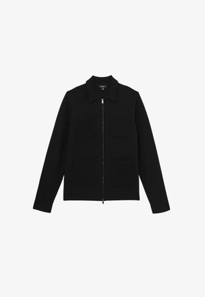 Schwarze Zip-Jacke aus strukturiertem Stoff, mit spitzem Kragen und zwei großen Fronttaschen. Klare Linien und taillierte Ärmel.