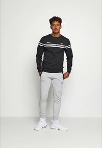 Ellesse OSTERIA - Tracksuit bottoms - grey