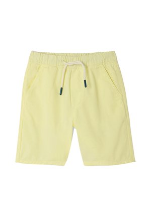 Light yellow knee-length shorts with elastic waistband and white drawstring with dark blue tips, featuring side pockets.