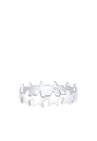 Anillo de plata de ley con formas de estrellas recortadas, con un acabado suave y un brillo pulido. Marcado con 925 para indicar la pureza de la plata.