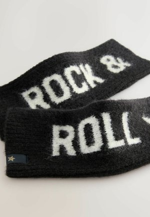 Svart ullhuvudband med vit text "ROCK & ROLL" som visas framträdande. Har en mjuk, strukturerad yta och en liten blå etikett med en stjärna.