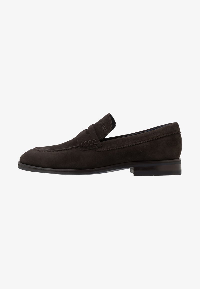 Dark brown suede loafers with a flat sole, a stitched accent along the edge, and a small, raised band at the front.