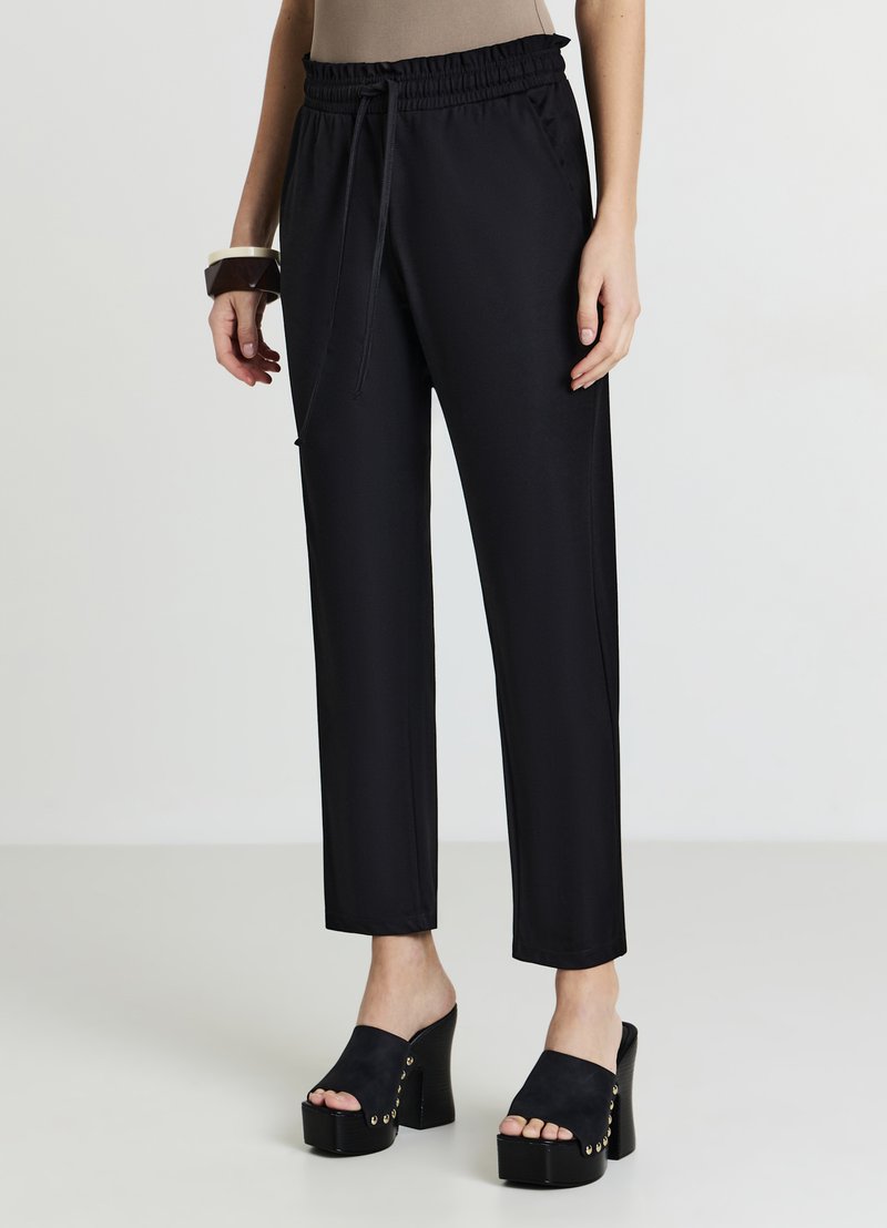 Calliope UNITA - Pantaloni sportivi - ultrablack